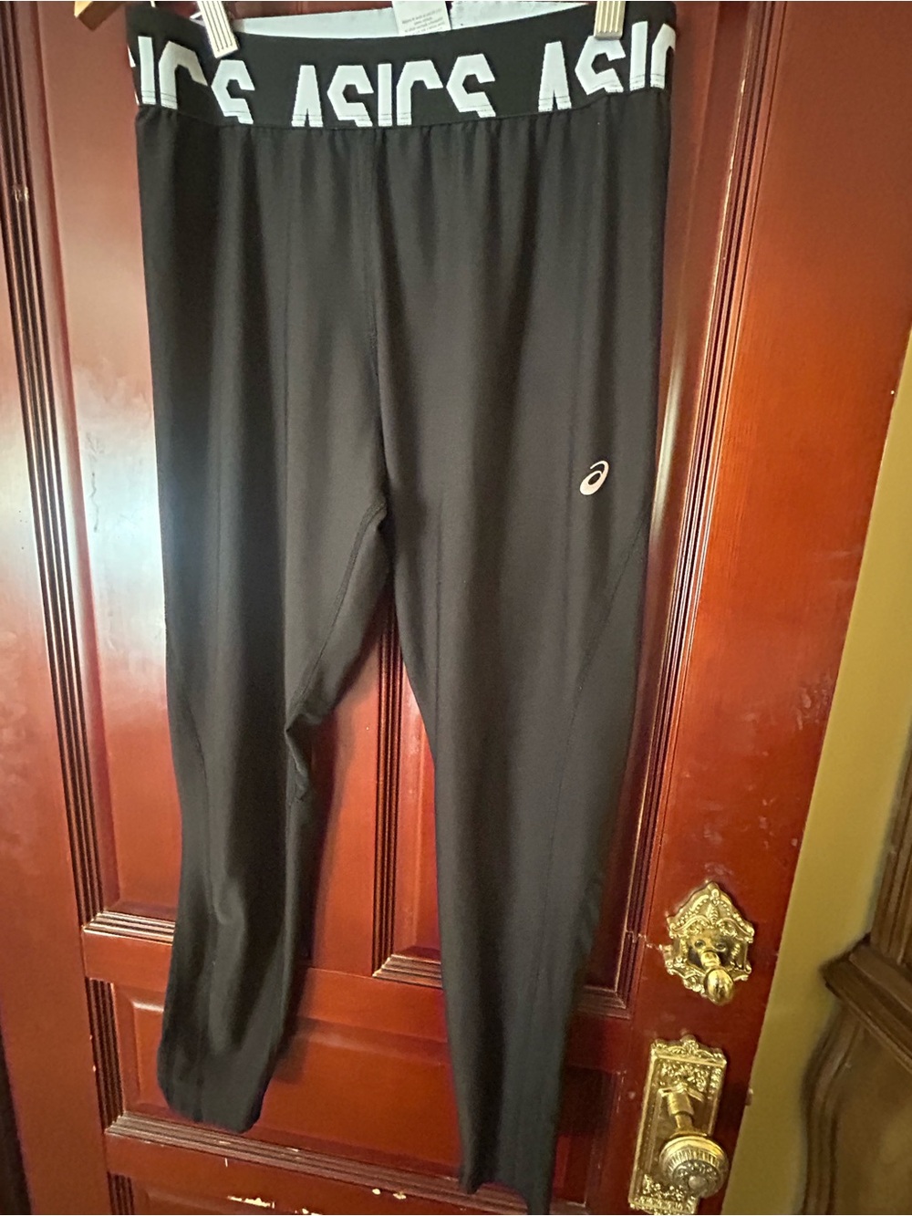 ASICS woman’s Black Performance Running Tights large